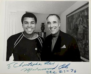 Muhammad Ali - Black & White photograph, signed 'To Christopher Lee Muhammad Ali Dec 23 - 76', 8 x 10 inchesProvenance: From 