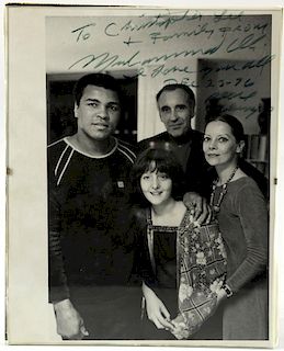 Muhammad Ali - Black & white photograph, signed 'To Christopher Lee & family From Muhammad Ali I love you all Dec 23 - 76 pea