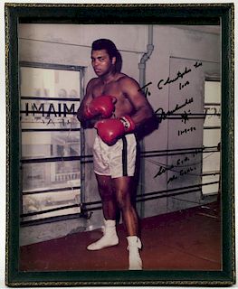 Muhammad Ali - Colour photograph, signed 'To Christopher Lee love Muhammad Ali 11-9-92 Serve God he is the goal', 10 x 8 inch