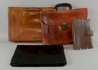 A Gucci documents leather folder & three other leather cases (4).Provenance: From the estate of Sir Christopher Lee