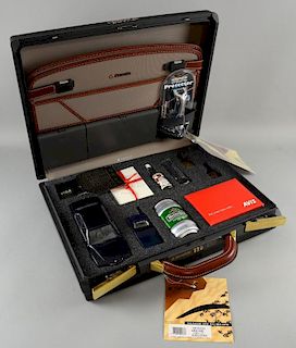 James Bond - Tomorrow Never Dies: A Samsonite promotional briefcase, produced in 1997, containing items relating to the movie