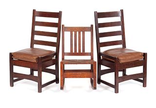 A PAIR OF STICKLEY OAK SIDE CHAIRS AND A STICKLEY ROCKER