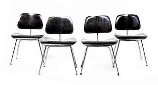 Four American Ebonized Wood DCM Chairs, Charles and Ray Eames for Herman Miller, Height 30 1/2 inches.