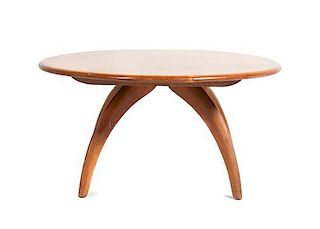 A Heywood Wakefield Occasional Table, Height 16 x diameter 32 inches.