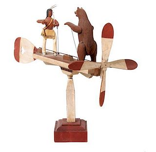 An American Folk Art Carved Wood and Polychrome Whirligig, Height 29 x length 41 1/2 inches.