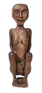 An African Carved Wood Figural Sculpture, Height 28 x width 8 x depth 6 1/4 inches.