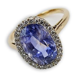 PGS Certified 7.50 Carat Oval Cut Natural Color Shift Intense Purplish Blue Sapphire and 14 Karat Rose and White Gold Ring