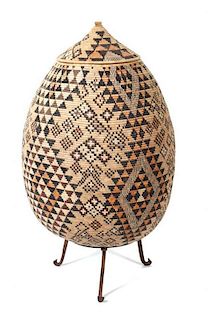 An African Woven Zula Basket, Height 30 1/2 inches.