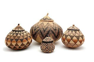 A Group of Four African Woven Zula Style Baskets, Height of tallest 10 1/2 inches.