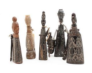 Five African Carved Bone and Wood Medicine Bottles, Height of tallest 9 1/2 inches.