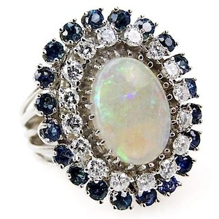 Vintage 1970s Australian Opal, 2.50 carat Round Brilliant Cut Diamond, Round Brilliant Cut Sapphire and 14 Karat White Gold R