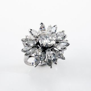 Circa 1950s Approx. 5.0 Carat TW Diamond and Platinum Cluster Ring set in the Center with a 1.33 Carat Round Brilliant Cut Di