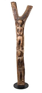 An African Carved Toguna House Post, Height 9 feet 11 inches.