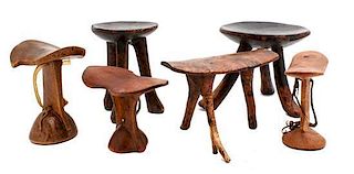 Four African Carved Wood Headrests, Height 7 7/8 x diameter 8 inches.
