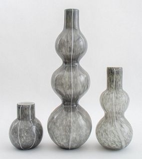 Mid-Century Modern group of three hand blown grey glass vases, apparently unsigned. Largest: 21" H x 6.5" Diameter.