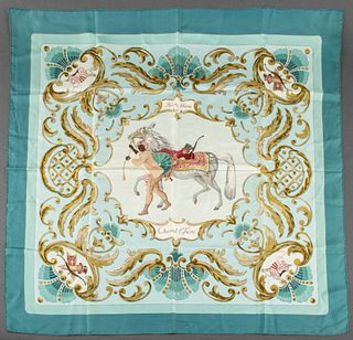 Hermes square silk twill scarf in the "Cheval Turc" pattern on an aquamarine blue ground, "HERMES - PARIS" above. 35" L x 35" W.