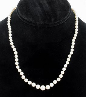 Vintage graduated hand knotted cultured pearl necklace with 10K gold filled hook clasp, marked: " S10K 1/20 GF". Necklace measures 17.5"L x 0.31"W at 