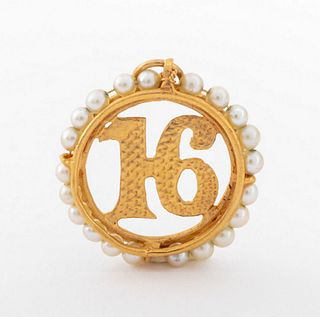 Vintage 14K yellow gold and seed pearl "16" round open latticework textured charm pendant. Pendant measures: 1.0"L x 0.812"W x 0.12"H. Gold tested. Ap