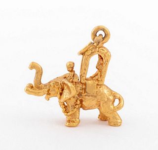 Vintage 14K yellow gold royal ride elephant charm pendant. Pendant: 0.62"L x 0.37"W. Gold tested. Approx: 1.8 dwt.