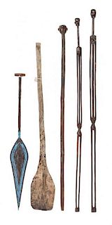 Three African Carved Wood Walking Sticks, Height of largest 64 1/2 inches.
