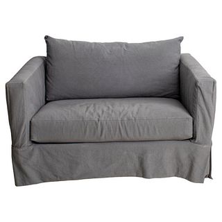 Modern sleeper sofa / couch, upholstered in gray canvas. 29" H x 52" W x 35" D; seat height: 19.5" H .
