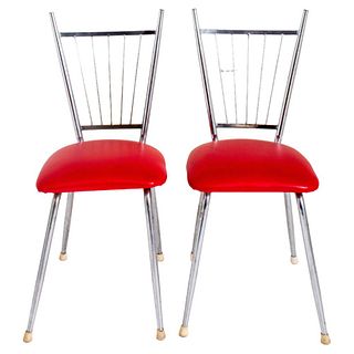 Midcentury modern chrome breakfast chairs,the pair with splayed wire back with finials, the shaped red vinyl rectangular seat above four tubular legs 