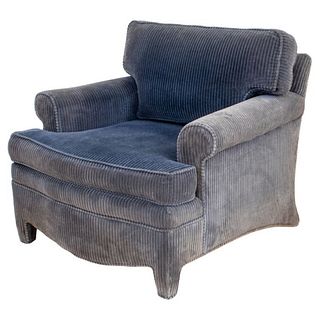 Lounge or armchair upholstered in blue ribbed velvet, marked. Some wear and light damage. 28" H x 32" W x 36" D; seat height: 17" H.