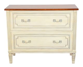 French Louis XVI style white painted with grey patina dresser or commode raised on square fluted feet, having a walnut top above two drawers. 36" H x 