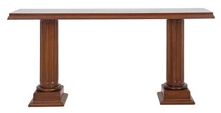 Neoclassical style walnut console table raised on double pedestal having round fluted column shape. 28" H x 60.5" W x 14.5" D.