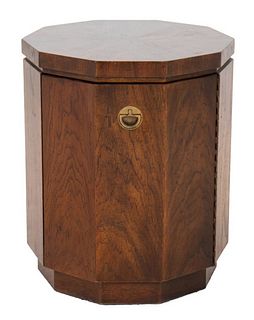 Campaign style "Accolade" by Drexel walnut hexagonal side cabinet, having one door with gilt metal pull. 21" H x 17.25" W x 17.25" D.
