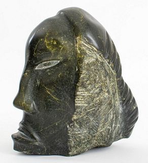 Alice Evaglok (Coppermine, Kugluktuk, Canadian, b. 1917) attributed green soapstone female head sculpture, with signature and date to underside "Alice