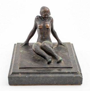 Patinated bronze sculpture depicting a nude seated woman, illegibly signed to base, mounted on a green marble stand. Sculpture: 3.5" H x 4.5" W x 3.75