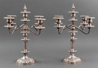 Pair of Baroque Revival silverplate five-arm weighted candelabra with repousse scrolling floral designs and swirling arms, detachable drip pans and re