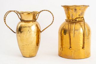 Indian pair of hammered brass vessels or vases, one with twisted handles, the other with twisted bow. Larger: 11.5" H x 7.75" Diameter.