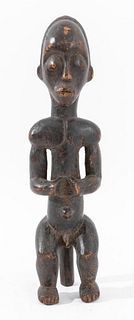 African carved wood figure, possibly Yoruba people, Ivory coast or Cote d'Ivoire. 9.75" H x 2" W x 2.5" D