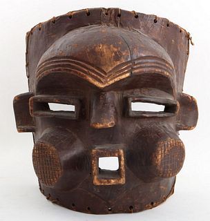 African mask, possibly Cote d'Ivoire or Ivory Coast, early 20th century or later, with heavily abstracted geometric style face with rounded forehead a