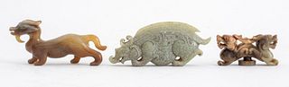 Chinese carved jade hardstone Dragon figures, 3, one a belt clasp, two others decorative. 2" H x 4.5" L x .5" W (the largest).