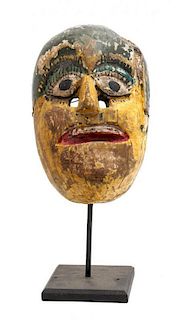 A Group of Five African Carved Wood Polychrome Masks, Height of largest 14 3/8 inches.