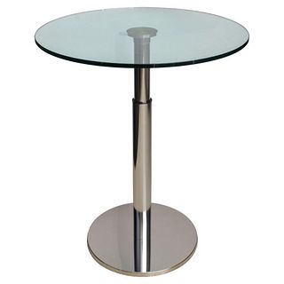 Modern Minimalist adjustable table, with a glass round top and a stainless steel base, possible to be at bar height or table height. 38.5" H x 31.25" 