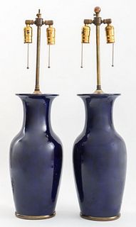 Pair of blue glazed willow leaf ceramic vases now mounted as lamps. 30" H x 7.5" diameter.