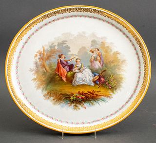Porcelain service tray with courting scene to center and gilt decor to rim, Sevres signature to verso. 1" H x 14.75" Diameter.