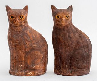 American Folk Art manner weighted, cast, carved, and painted plaster cat-form doorstops, two (2), depicted as seated, with thoughtful expressions and 