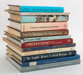 Twelve Judaica reference books, including: "A Treasury of Sephardic Laws and Customs" by Rabbi Herbert C. Dobrinsky, "Treasury from the Torah" by Morr