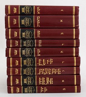 Set of nine Judaica books, written in Hebrew and leather-bound. 10.25" H x 6.75" W.