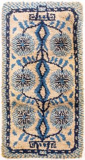 Blue and white Scandinavian rya rug of an abstracted bull, high pile wool, unmarked. 5' 2" H x 2' 8" W.