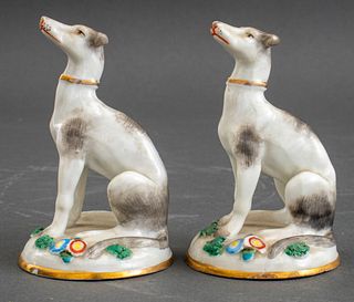 Two polychromed English porcelain diminutive whippets, each bearing gold anchor mark of the Chelsea Porcelain factory for 1756-1769. 3.25" H x 2" diam
