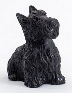 Daum France black pate de verre Scottie Dog figurine depicting an inquisitive Scottie, signed "Daum France" to the underside. 2.75" H x 2.5" L x 1.5" 