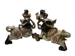 Pair Of Chinese Carved Stone Foo- Dogs