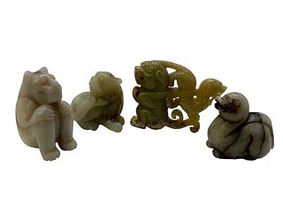 Four Chinese Celadon And Russet Jade Carvings