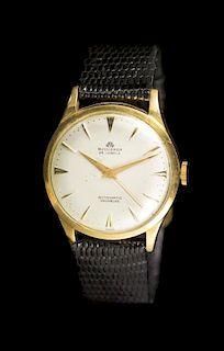 * An 18 Karat Yellow Gold Automatic Wristwatch, Bucherer,